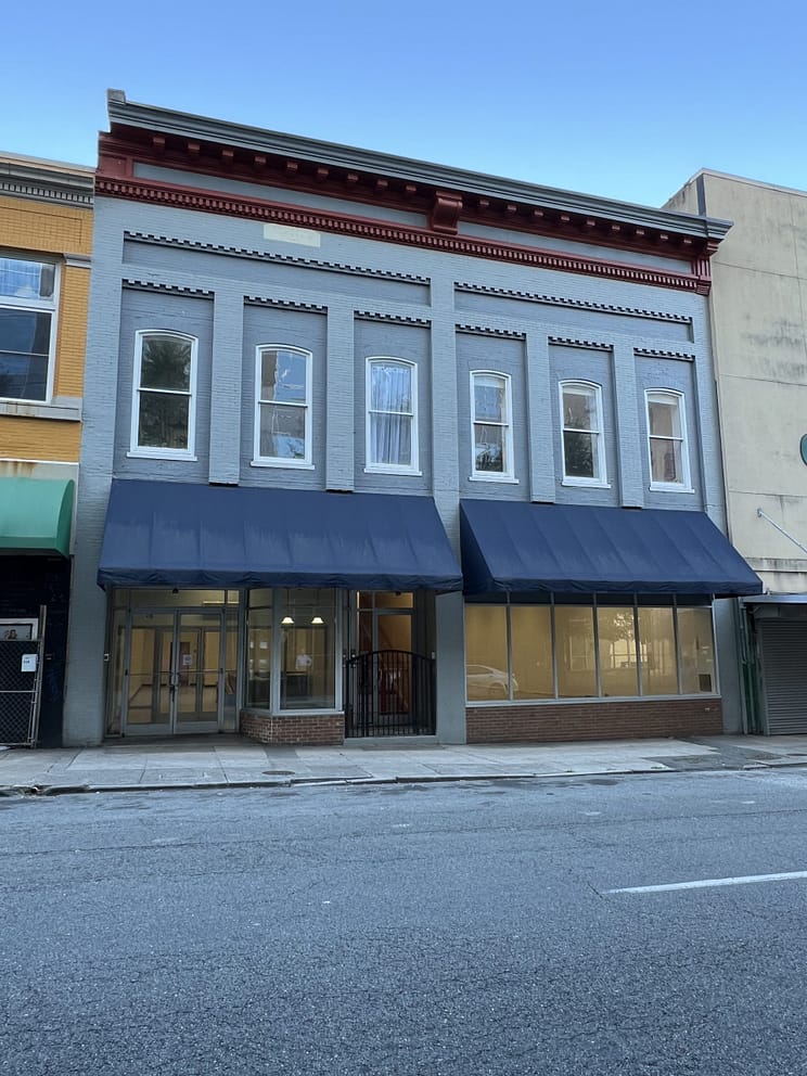 commercial building with lights on
